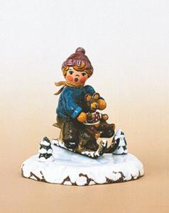 Winterkinder Schlittenfahrer